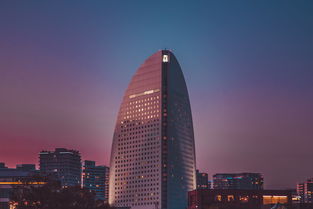 王健林再度出售境外资产，聚焦转型与全球战略布局